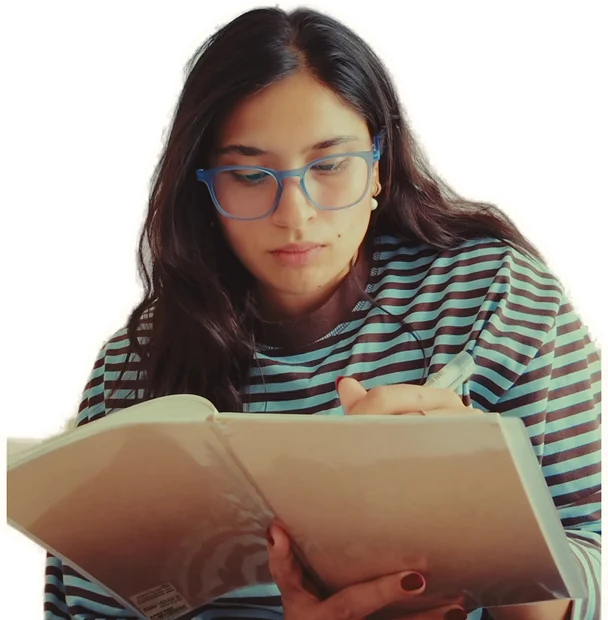 Varnika sitting on top of the journal, reading